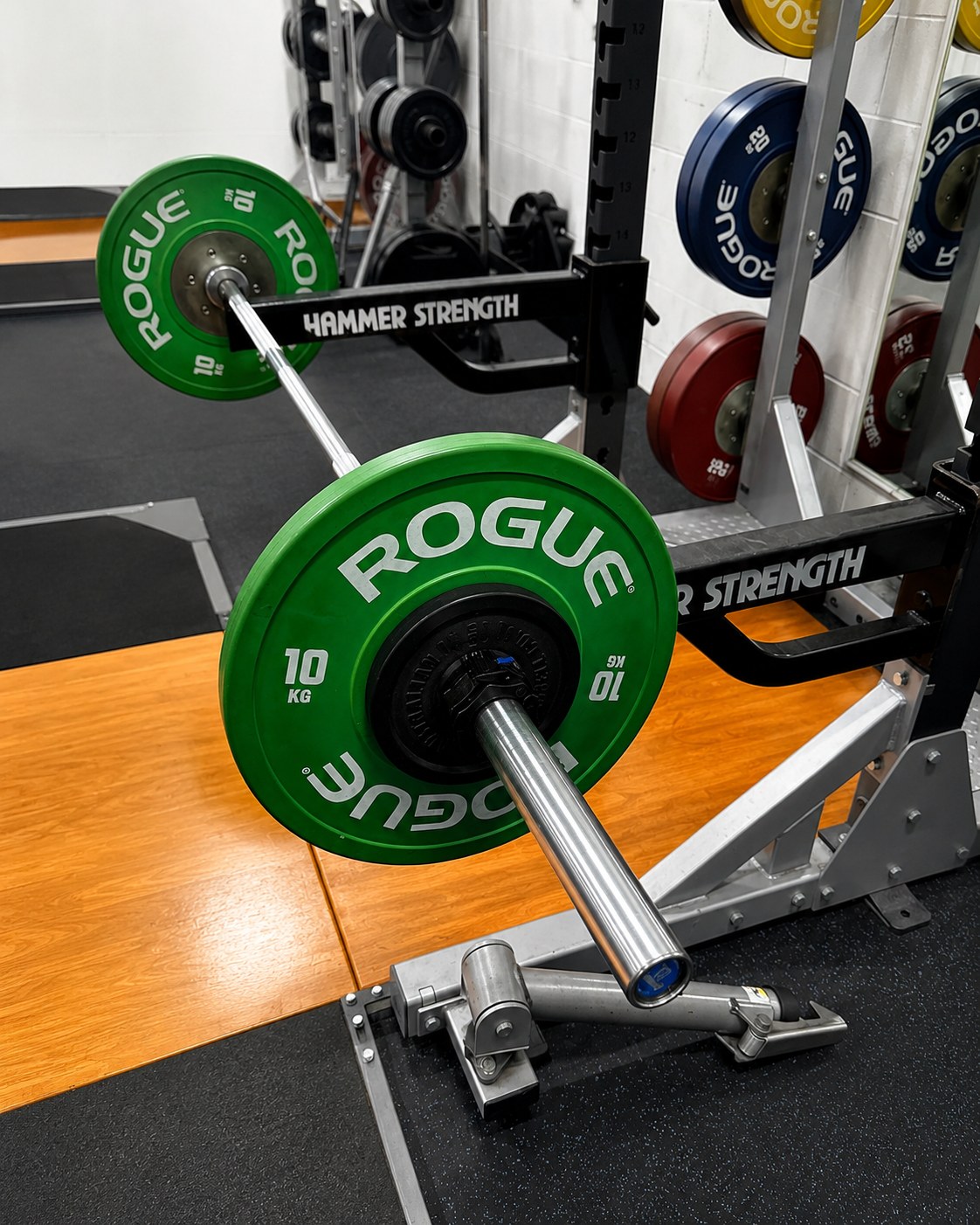 Strength training with barbell and plates